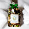 Cotton Fields potpourri bag by Irish Twins, featuring natural dried botanicals and a fresh, clean scent, nestled amongst soft white towels.
